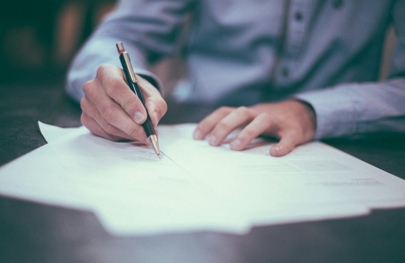 Person signing official documents