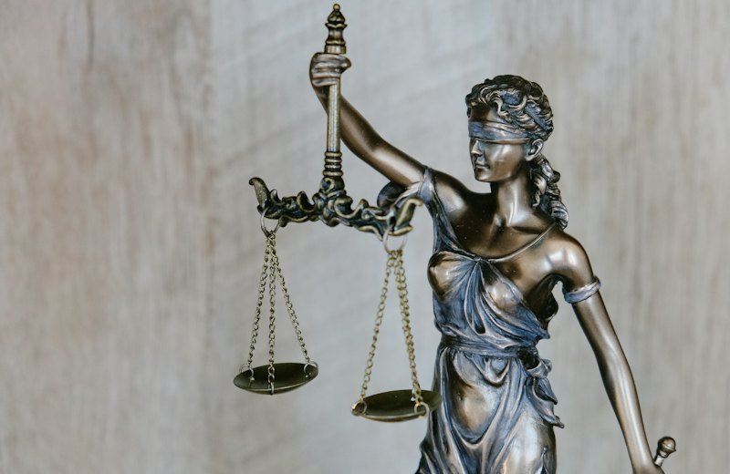 Lady Justice statue holding scales